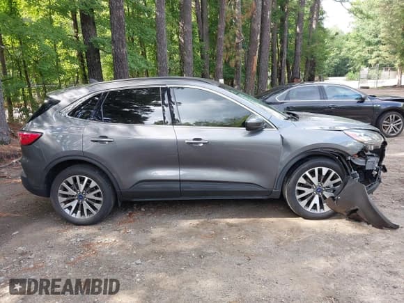 ✅ 2021 Ford Escape Titanium Hybrid • VIN: 1FMCU9DZ1MUB25825 • Lot: 43009089. Listed on IAAI with 33,260 mi. Free auction sales archive from the USA and detailed vehicle history report at DreamBid. Image 13.