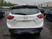 ✅ 2016 Mazda CX-5 Sport • VIN: JM3KE4BY2G0802376 • Lot: 55976585. Listed on Copart with 112,600 mi. Free auction sales archive from the USA and detailed vehicle history report at DreamBid. Image 6.