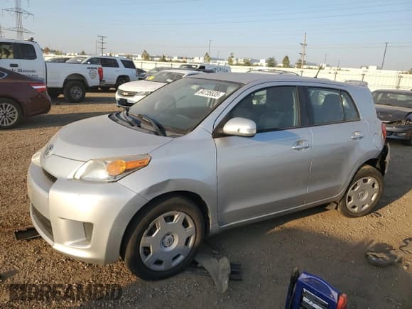 ✅ 2012 Scion xD • VIN: JTKKU4B42C1018656 • Lot: 84735535. Listed on Copart with 96,290 mi. Free auction sales archive from the USA and detailed vehicle history report at DreamBid. Image 1.