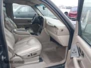 ✅ 2004 Chevrolet Suburban LT • VIN: 1GNFK16Z64J237342 • Lot: 43737874. Listed on IAAI with Not provided. Free auction sales archive from the USA and detailed vehicle history report at DreamBid. Image 5.