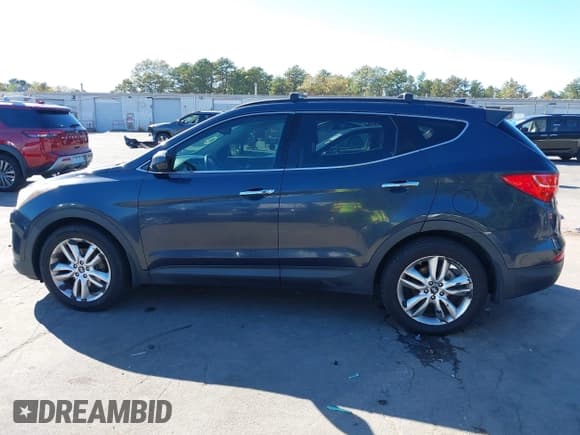 ✅ 2013 Hyundai Santa Fe Sport • VIN: 5XYZU3LA4DG099729 • Lot: 43463958. Listed on IAAI with 164,931 mi. Free auction sales archive from the USA and detailed vehicle history report at DreamBid. Image 13.