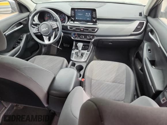 ✅ 2023 Kia Seltos LX • VIN: KNDEPCAA2P7395052 • Лот: 80368405. Опубликован ранее на Copart с пробегом 56 906 миль. Бесплатный доступ к архиву аукционных продаж из США и подробный отчёт об истории автомобиля на DreamBid. Изображение 8.