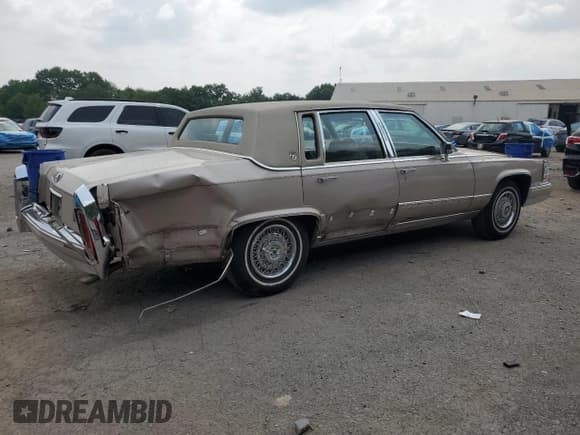 ✅ 1991 Cadillac Brougham • VIN: 1G6DW54E7MR717745 • Лот: 67960205. Опубликован ранее на Copart с пробегом 84 797 миль. Бесплатный доступ к архиву аукционных продаж из США и подробный отчёт об истории автомобиля на DreamBid. Изображение 3.