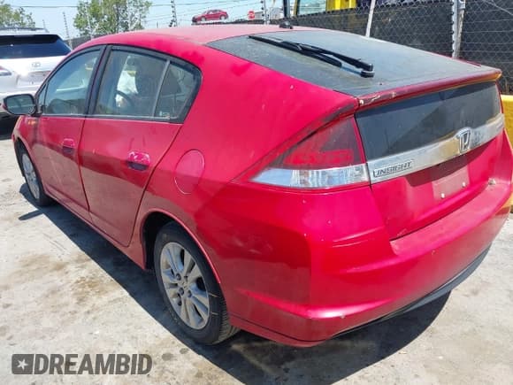 ✅ 2012 Honda Insight EX • VIN: JHMZE2H71CS001817 • Lot: 42148358. Listed on IAAI with 161,254 mi. Free auction sales archive from the USA and detailed vehicle history report at DreamBid. Image 3.