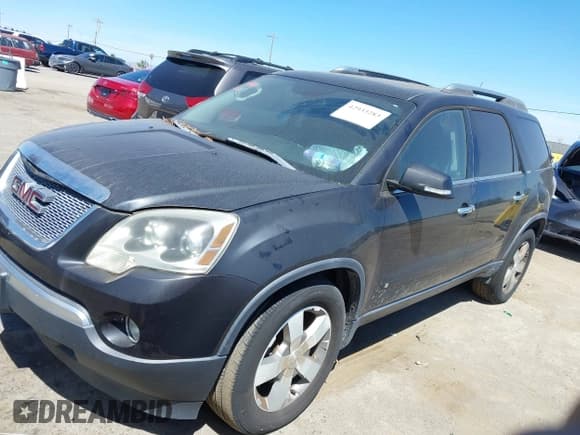 ✅ 2009 GMC Acadia SLT1 • VIN: 1GKEV23D39J216003 • Lot: 42933283. Listed on IAAI with 153,799 mi. Free auction sales archive from the USA and detailed vehicle history report at DreamBid. Image 2.