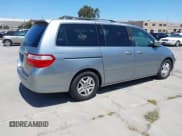 ✅ 2006 Honda Odyssey EX-L • VIN: 5FNRL38716B051664 • Lot: 42520320. Listed on IAAI with 304,835 mi. Free auction sales archive from the USA and detailed vehicle history report at DreamBid. Image 4.