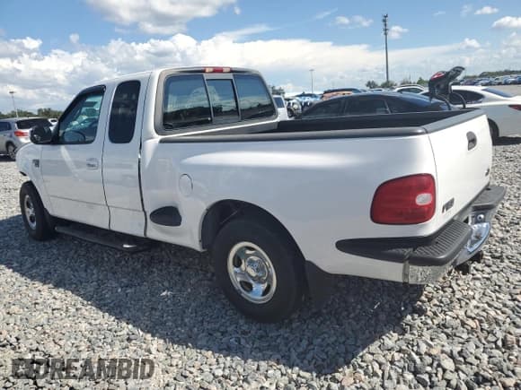 ✅ 2000 Ford F-150 XL • VIN: 1FTRX07LXYKA38662 • Lot: 68012515. Wystawiony na Copart z przebiegiem 96 880 mil. Bezpłatny archiwum sprzedaży aukcyjnych z USA i szczegółowy raport historii pojazdu na DreamBid. Zdjęcie 2.