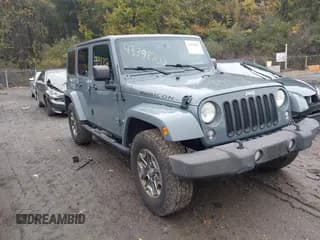 ✅ 2014 Jeep Wrangler Unlimited Rubicon • VIN: 1C4HJWFG6EL183479 • Lot: 43398702. Listed on IAAI with 166,700 mi. Free auction sales archive from the USA and detailed vehicle history report at DreamBid. Image 1.