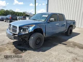 2005 Dodge Dakota SLT с VIN 1D7HW48N15S214537, выставлен на аукционе Copart как лот 70814875 с пробегом 175 405 миль миль и Списание • Salvage title. История ставок и продаж доступна на DreamBid. Изображение 1.