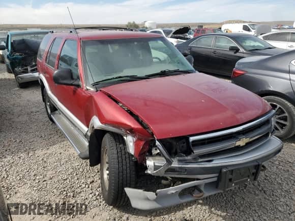 1997 Chevrolet Blazer LS with VIN 1GNDT13W5V2245085, listed as a Copart auction lot 75058904 with 272,777 mi miles and Salvage title. Bid and sale history available at DreamBid. Image 4.