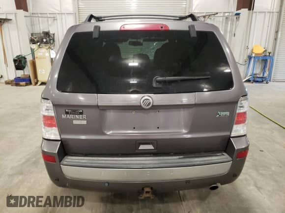 2011 Mercury Mariner Premier z VIN 4M2CN9HG6BKJ05342, wystawiony jako Copart lot #54748555 z przebiegiem 168 073 mil mil oraz Szkoda całkowita • Salvage title. Historia ofert i sprzedaży dostępna na DreamBid. Obrazek 6.