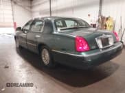 ✅ 1998 Lincoln Town Car Signature • VIN: 1LNFM82W8WY720232 • Lot: 42125723. Listed on IAAI with 132,494 mi. Free auction sales archive from the USA and detailed vehicle history report at DreamBid. Image 3.