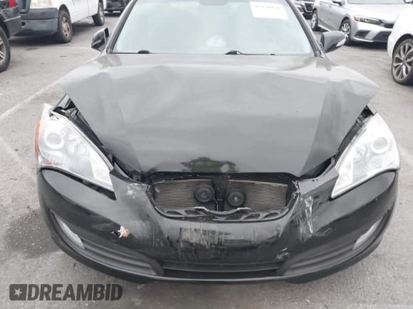 ✅ 2012 Hyundai Genesis Coupe Grand Touring • VIN: KMHHU6KH9CU071252 • Lot: 42358871. Wystawiony na IAAI z przebiegiem 92 528 mil. Bezpłatny archiwum sprzedaży aukcyjnych z USA i szczegółowy raport historii pojazdu na DreamBid. Zdjęcie 10.