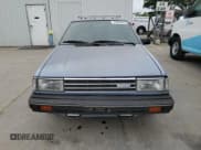 ✅ 1985 Nissan Sentra • VIN: JN1PB15S6FU172045 • Lot: 54384475. Wystawiony na Copart z przebiegiem 134 117 mil. Bezpłatny archiwum sprzedaży aukcyjnych z USA i szczegółowy raport historii pojazdu na DreamBid. Zdjęcie 5.