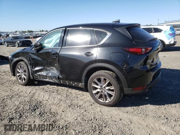 ✅ 2019 Mazda CX-5 Grand Touring • VIN: JM3KFBDM6K0550989 • Lot: 82416825. Wystawiony na Copart z przebiegiem 123 806 mil. Bezpłatny archiwum sprzedaży aukcyjnych z USA i szczegółowy raport historii pojazdu na DreamBid. Zdjęcie 2.
