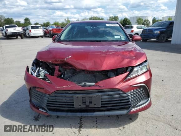 2021 Toyota Camry LE with VIN 4T1C11BK0MU023660, listed as a Copart auction lot 70505895 with 54,746 mi miles and Salvage title. Bid and sale history available at DreamBid. Image 5.