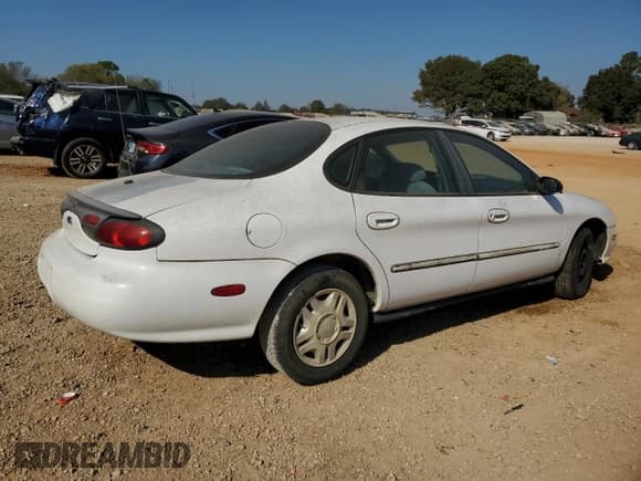 ✅ 1999 Ford Taurus LX • VIN: 1FAFP52U4XA196442 • Лот: 77567714. Опубликован ранее на Copart с пробегом 137 412 миль. Бесплатный доступ к архиву аукционных продаж из США и подробный отчёт об истории автомобиля на DreamBid. Изображение 3.