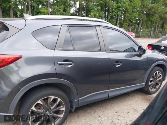 ✅ 2016 Mazda CX-5 Grand Touring • VIN: JM3KE2DY6G0840159 • Lot: 43179646. Wystawiony na IAAI z przebiegiem 71 500 mil. Bezpłatny archiwum sprzedaży aukcyjnych z USA i szczegółowy raport historii pojazdu na DreamBid. Zdjęcie 13.