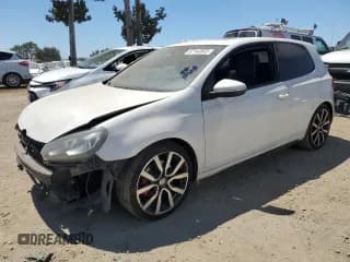 ✅ 2012 Volkswagen Golf GTI w/Conv & Sunroof • VIN: WVWEV7AJXCW009863 • Lot: 67143665. Listed on Copart with 123,549 mi. Free auction sales archive from the USA and detailed vehicle history report at DreamBid. Image 1.