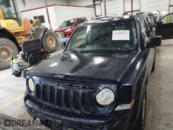 ✅ 2014 Jeep Patriot Latitude • VIN: 1C4NJRFB0ED730765 • Lot: 42309571. Listed on IAAI with 218,577 mi. Free auction sales archive from the USA and detailed vehicle history report at DreamBid. Image 12.