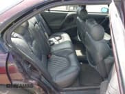 ✅ 1999 Pontiac Bonneville SSE • VIN: 1G2HZ52K9XH233332 • Лот: 41933677. Опубликован ранее на IAAI с пробегом 180 005 миль. Бесплатный доступ к архиву аукционных продаж из США и подробный отчёт об истории автомобиля на DreamBid. Изображение 8.