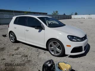 ✅ 2013 Volkswagen Golf R w/Sunroof & Navi • VIN: WVWPF7AJXDW079497 • Лот: 56458905. Опубликован ранее на Copart с пробегом 84 101 миль. Бесплатный доступ к архиву аукционных продаж из США и подробный отчёт об истории автомобиля на DreamBid. Изображение 4.