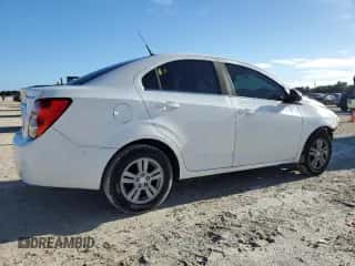 2014 Chevrolet Sonic LT с VIN 1G1JC5SHXE4158446, выставлен на аукционе Copart как лот 69762364 с пробегом 125 356 миль миль и Списание • Salvage title. История ставок и продаж доступна на DreamBid. Изображение 3.