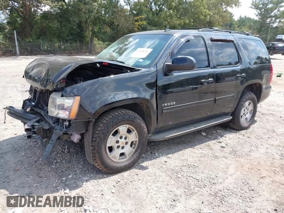 ✅ 2014 Chevrolet Tahoe LT • VIN: 1GNSCBE09ER117431 • Lot: 43158315. Listed on IAAI with 189,127 mi. Free auction sales archive from the USA and detailed vehicle history report at DreamBid. Image 18.