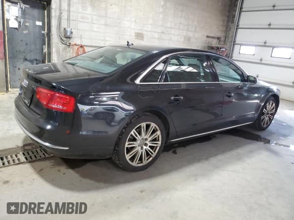 ✅ 2014 Audi A8 3.0T • VIN: WAURGAFD2EN011494 • Лот: 84004045. Опубликован ранее на Copart с пробегом 105 787 миль. Бесплатный доступ к архиву аукционных продаж из США и подробный отчёт об истории автомобиля на DreamBid. Изображение 3.