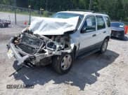 ✅ 2004 Ford Escape XLS • VIN: 1FMYU021X4DA22109 • Lot: 42710754. Listed on IAAI with Not provided. Free auction sales archive from the USA and detailed vehicle history report at DreamBid. Image 2.