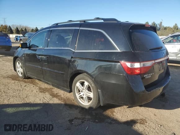 ✅ 2012 Honda Odyssey Touring • VIN: 5FNRL5H94CB079872 • Lot: 91557415. Listed on Copart with 91,466 mi. Free auction sales archive from the USA and detailed vehicle history report at DreamBid. Image 2.