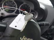 ✅ 2009 Jeep Wrangler Rubicon • VIN: 1J8GA64199L700024 • Lot: 43489305. Wystawiony na IAAI z przebiegiem 231 167 mil. Bezpłatny archiwum sprzedaży aukcyjnych z USA i szczegółowy raport historii pojazdu na DreamBid. Zdjęcie 11.