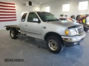 ✅ 1999 Ford F-150 XL • VIN: 2FTRX18L0XCB09603 • Lot: 85913455. Wystawiony na Copart z przebiegiem Nie podano. Bezpłatny archiwum sprzedaży aukcyjnych z USA i szczegółowy raport historii pojazdu na DreamBid. Zdjęcie 4.