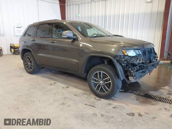 2017 Jeep Grand Cherokee Trailhawk with VIN 1C4RJFLG5HC651781, listed as a IAAI auction lot 43519696 with 120,213 mi miles and . Bid and sale history available at DreamBid. Image 1.