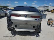 ✅ 2022 BMW X6 M • VIN: 5YMCY0C04N9L05612 • Lot: 84254655. Listed on Copart with 12,648 mi. Free auction sales archive from the USA and detailed vehicle history report at DreamBid. Image 6.