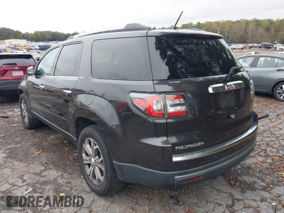 ✅ 2016 GMC Acadia SLT • VIN: 1GKKRRKD9GJ146781 • Lot: 43548079. Listed on IAAI with 148,049 mi. Free auction sales archive from the USA and detailed vehicle history report at DreamBid. Image 3.