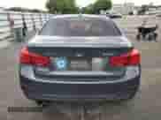 2018 BMW 3 Series 330i xDrive with VIN WBA8D9G57JNU70847, listed as a Copart auction lot 82004405 with 106,746 mi miles and Salvage title. Bid and sale history available at DreamBid. Image 6.