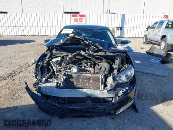 ✅ 2018 Honda Civic LX • VIN: 19XFC2F55JE005154 • Lot: 43661806. Listed on IAAI with 99,103 mi. Free auction sales archive from the USA and detailed vehicle history report at DreamBid. Image 12.