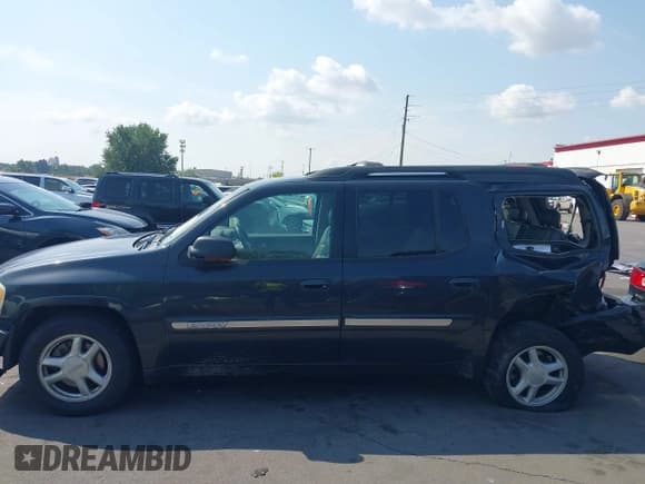 ✅ 2003 GMC Envoy SLE • VIN: 1GKET16S836232394 • Lot: 43072136. Listed on IAAI with 251,123 mi. Free auction sales archive from the USA and detailed vehicle history report at DreamBid. Image 14.
