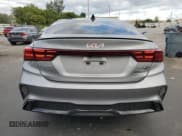 ✅ 2023 Kia Forte GT-Line • VIN: 3KPF54AD9PE661807 • Lot: 92993015. Wystawiony na Copart z przebiegiem 30 210 mil. Bezpłatny archiwum sprzedaży aukcyjnych z USA i szczegółowy raport historii pojazdu na DreamBid. Zdjęcie 6.