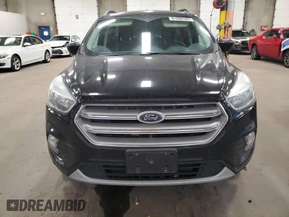 2018 Ford Escape SE z VIN 1FMCU9GD5JUA85387, wystawiony jako Copart lot #91200335 z przebiegiem 142 271 mil mil oraz Szkoda całkowita • Salvage title. Historia ofert i sprzedaży dostępna na DreamBid. Obrazek 5.