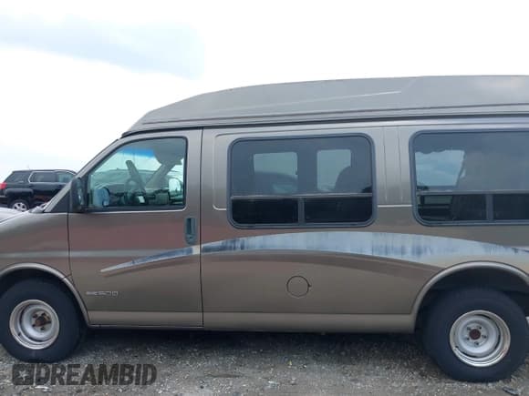 ✅ 2002 GMC Savana • VIN: 1GDFG15W421219416 • Lot: 42572876. Listed on IAAI with 221,321 mi. Free auction sales archive from the USA and detailed vehicle history report at DreamBid. Image 14.