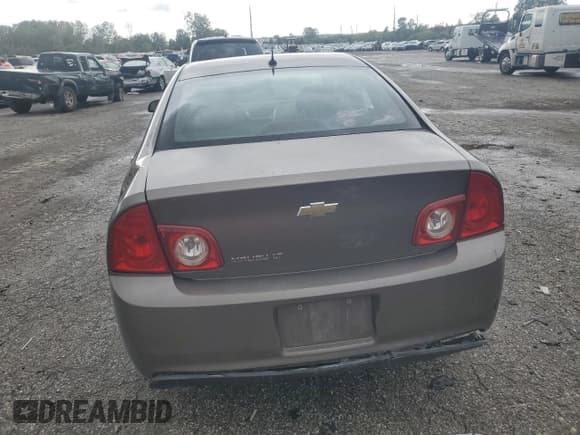 ✅ 2011 Chevrolet Malibu 1LS • VIN: 1G1ZB5E15BF205385 • Lot: 72814394. Listed on Copart with 142,914 mi. Free auction sales archive from the USA and detailed vehicle history report at DreamBid. Image 6.