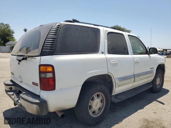 ✅ 2002 GMC Yukon SLE • VIN: 1GKEC13V72R253670 • Лот: 62846265. Опубликован ранее на Copart с пробегом 440 039 миль. Бесплатный доступ к архиву аукционных продаж из США и подробный отчёт об истории автомобиля на DreamBid. Изображение 3.