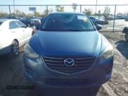 ✅ 2016 Mazda CX-5 Grand Touring • VIN: JM3KE4DY9G0788716 • Lot: 43592205. Listed on IAAI with 92,210 mi. Free auction sales archive from the USA and detailed vehicle history report at DreamBid. Image 12.