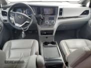 ✅ 2015 Toyota Sienna Limited • VIN: 5TDDK3DC9FS127157 • Lot: 82362895. Listed on Copart with 101,877 mi. Free auction sales archive from the USA and detailed vehicle history report at DreamBid. Image 8.