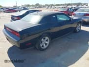 ✅ 2012 Dodge Challenger SXT Plus • VIN: 2C3CDYAG7CH257561 • Lot: 43670021. Listed on IAAI with 163,751 mi. Free auction sales archive from the USA and detailed vehicle history report at DreamBid. Image 4.