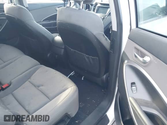 2018 Hyundai Santa Fe 2.4L z VIN 5NMZUDLB1JH097002, wystawiony jako IAAI lot #43473652 z przebiegiem 182 069 mil mil oraz . Historia ofert i sprzedaży dostępna na DreamBid. Obrazek 8.