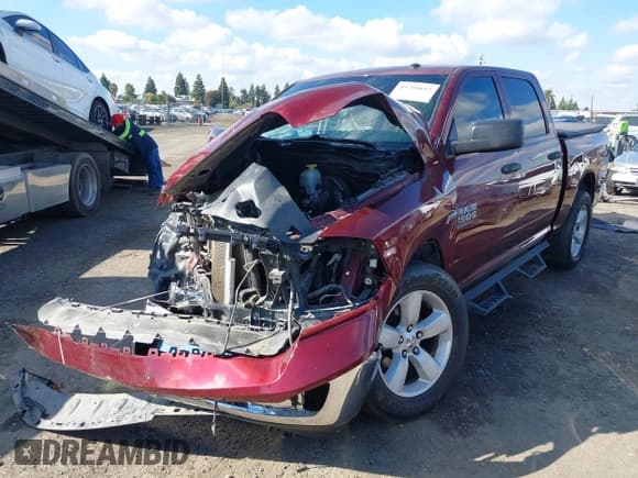 ✅ 2021 Ram 1500 Tradesman • VIN: 3C6RR6KT1MG535919 • Lot: 43704853. Listed on IAAI with 76,154 mi. Free auction sales archive from the USA and detailed vehicle history report at DreamBid. Image 2.