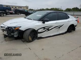 ✅ 2023 Toyota Camry XSE • VIN: 4T1KZ1AK0PU076563 • Lot: 89712595. Listed on Copart with 48,816 mi. Free auction sales archive from the USA and detailed vehicle history report at DreamBid. Image 1.